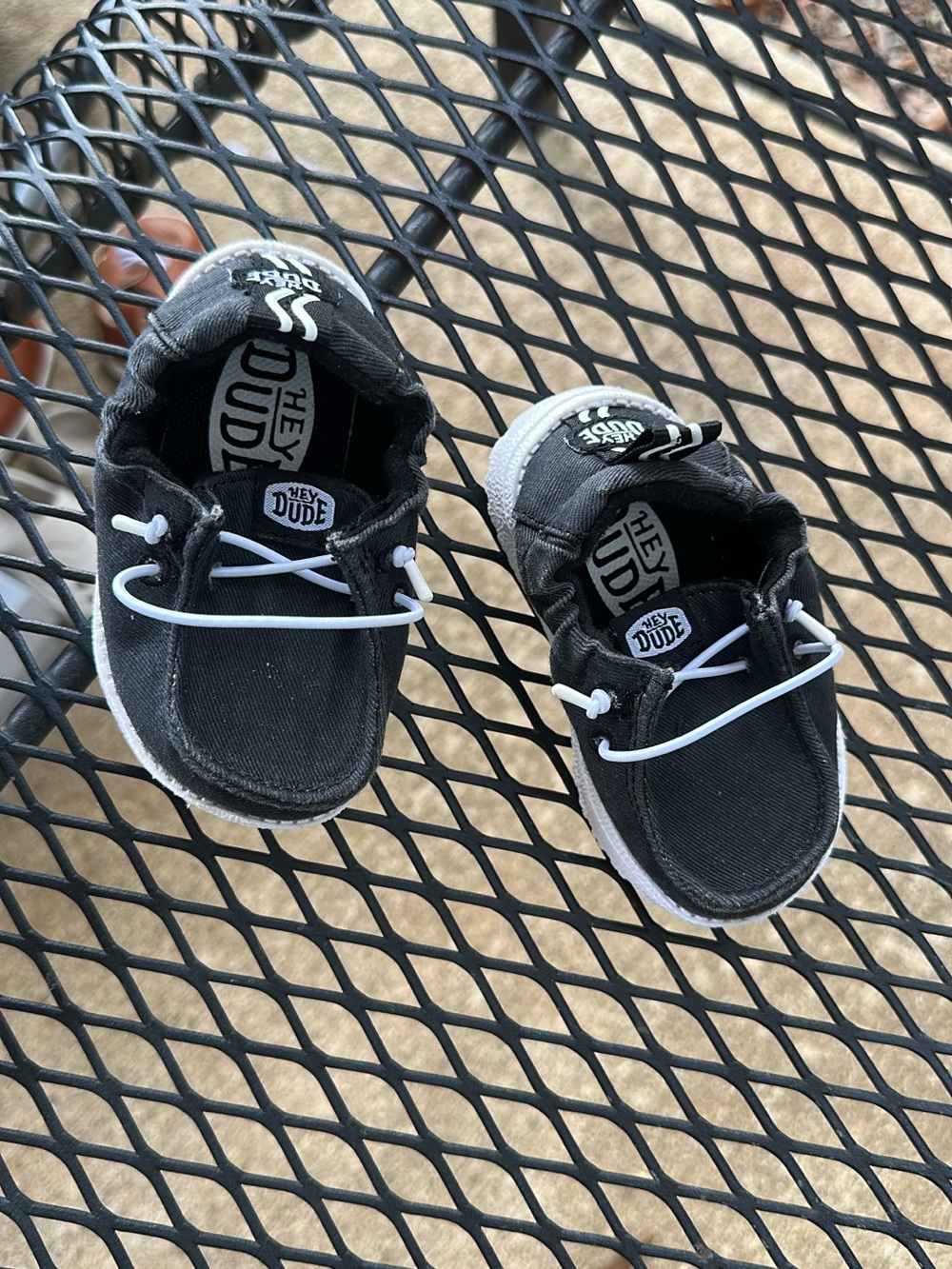 Hey Dude Kids Black Canvas Slip-On Sneakers with White Accents